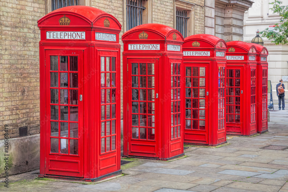 Famous red telephone booths in Covent Garden street, London, England Famous red telephone booths in Covent Garden street, London, England