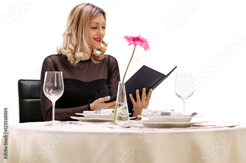 Woman reading the menu © Ljupco Smokovski