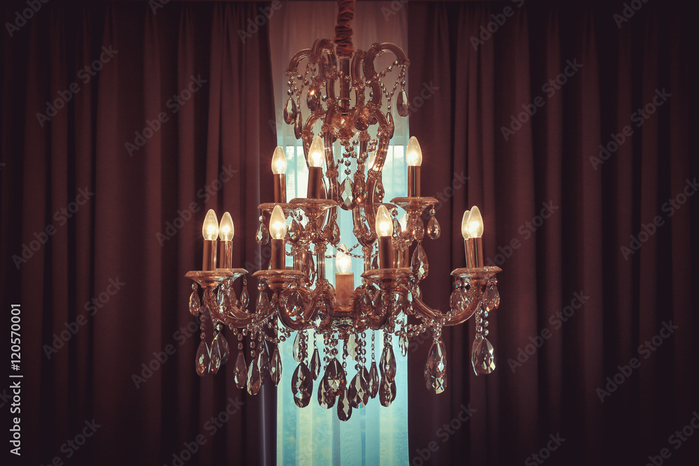 Vintage shining chandelier and curtain
