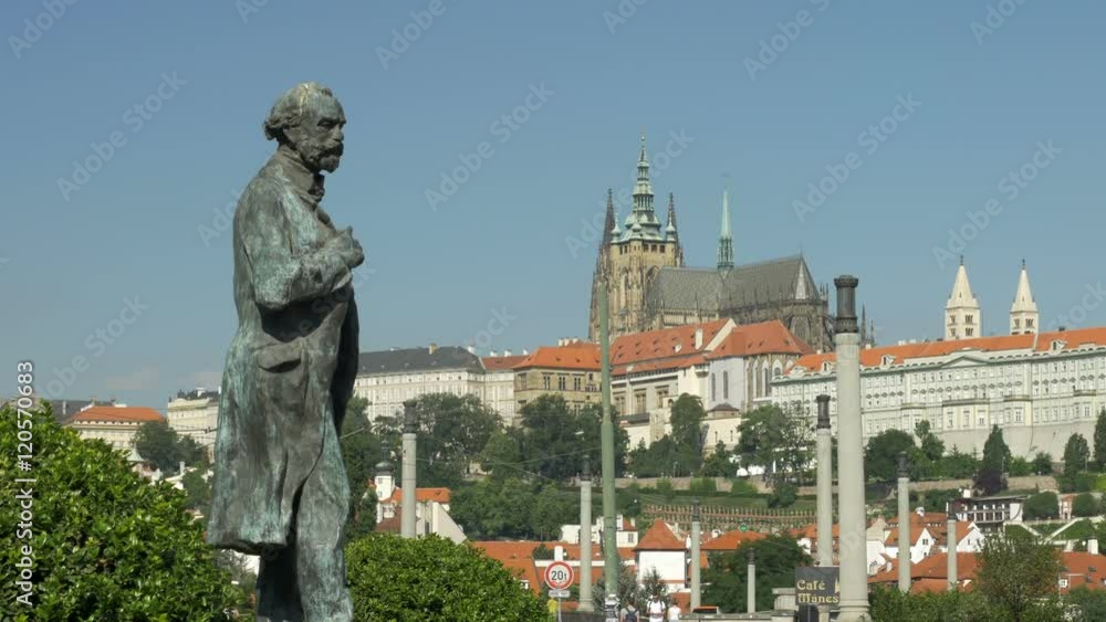 Statue of Antonin Dvorak on Jan Palach Square in Prague. Prague castle and St Vitus cathedral are in the background Statue of Antonin Dvorak on Jan Palach Square in Prague. Prague castle and St Vitus cathedral are in the background