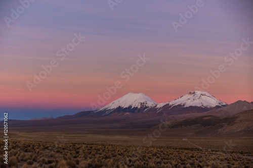 Sunset in Andes. Parinacota and Pomerade volcanos.