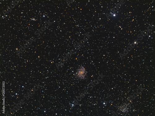 Fireworks Galaxy NGC 6946 and NGC 6939 Cluster near Milky Way