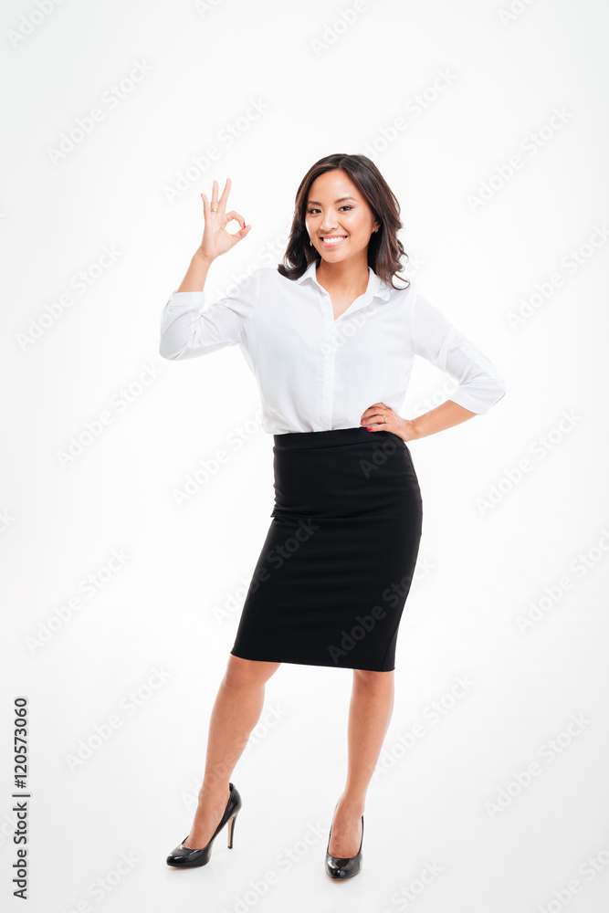 Happy young asian businesswoman showing ok sign isolated Happy young asian businesswoman showing ok sign isolated