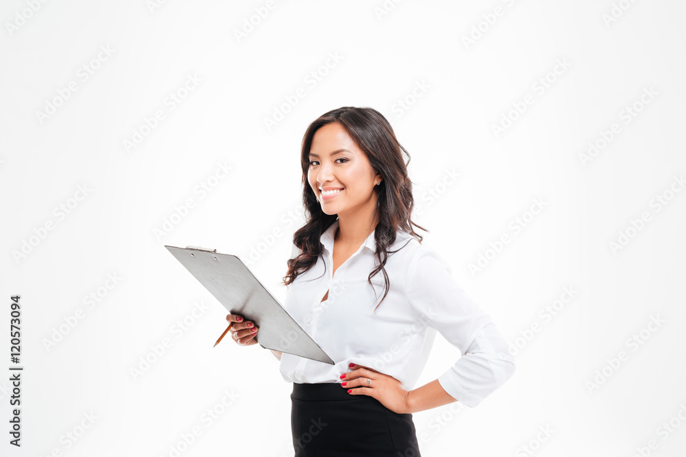Friendly young smiling asian businesswoman with clipboard and pencil
