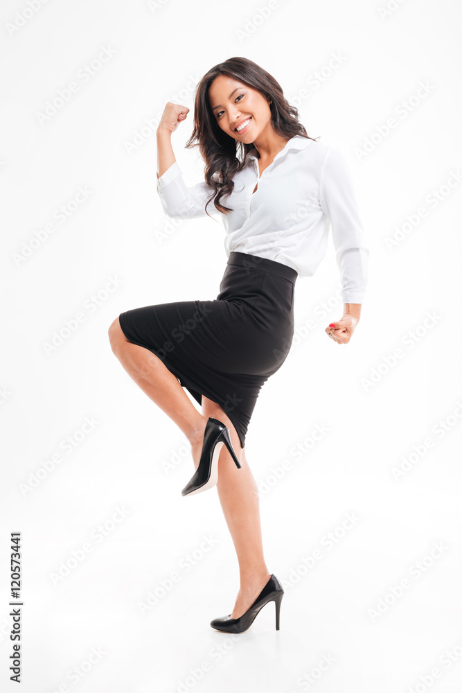 Portrait of a smiling happy asian businesswoman celebrating her success Portrait of a smiling happy asian businesswoman celebrating her success