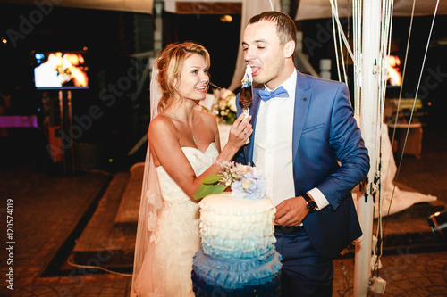 Stylish smilind happy bride and groom photo