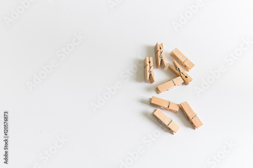 Wood clothespins isolated background