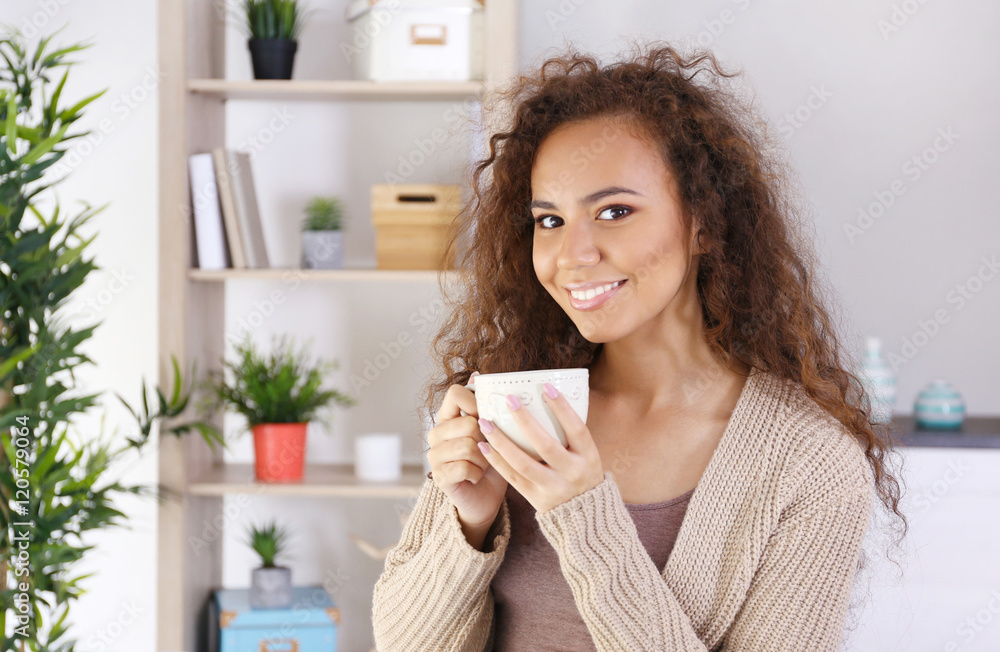 Portrait of beautiful African American girl with coffee Portrait of beautiful African American girl with coffee