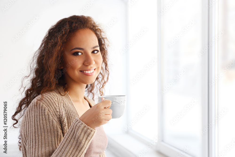 Portrait of beautiful African American girl with coffee Portrait of beautiful African American girl with coffee