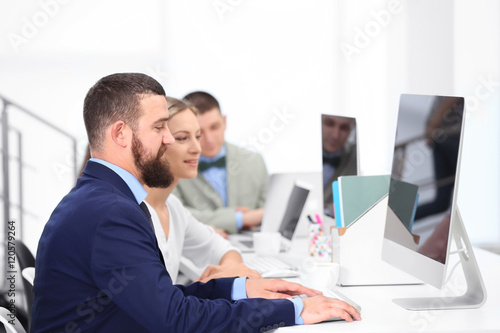 People working on computers...