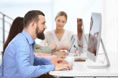 People working on computers...