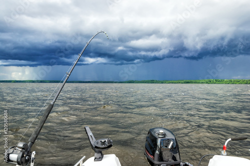 Lake fishing in stormy weather