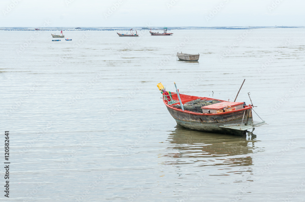 Fototapeta premium Small fishing boat at seaside of Bangpra, Chonburi province,thailand