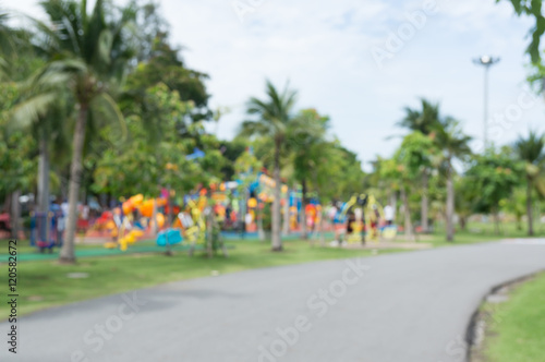 Blur of Colorful playground on yard in the park.