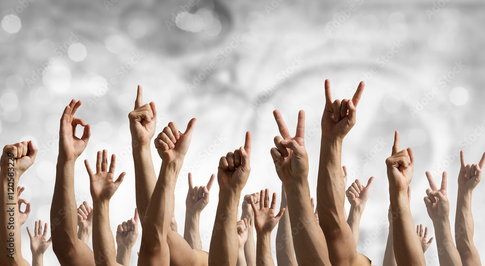 Group of people with raised hands . Mixed media Group of people with raised hands . Mixed media