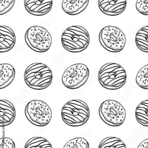 Seamless pattern with donuts.