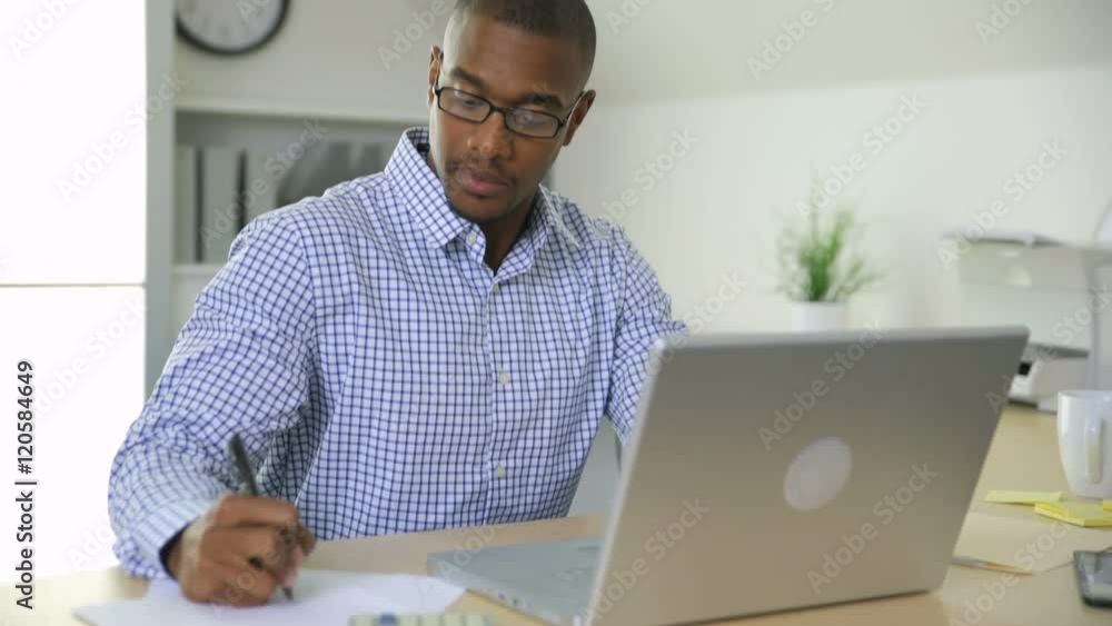 Businessman working on computer in office