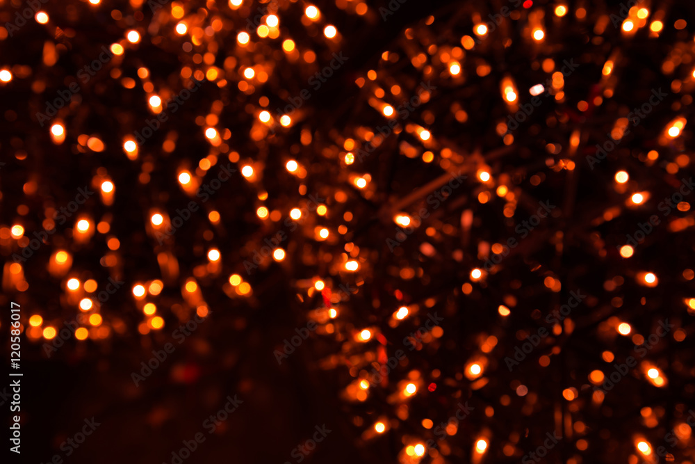 abstract orange bokeh light on the dark background. abstract orange bokeh light on the dark background.