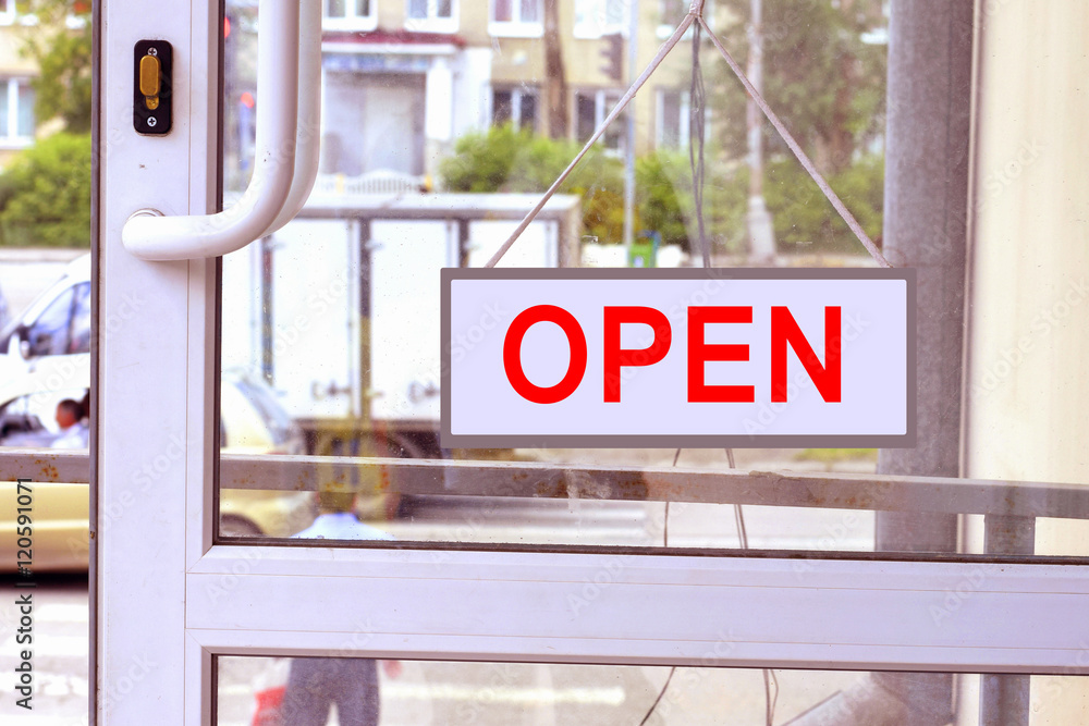 Fototapeta premium A sign with red letters on the front door