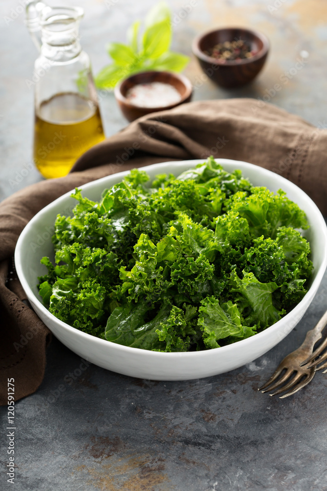 Fresh kale with olive oil, salt and pepper Fresh kale with olive oil, salt and pepper