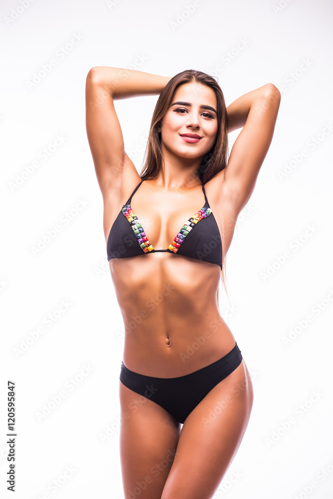 Fototapeta premium Woman in swimsuit with perfect abs, fit body