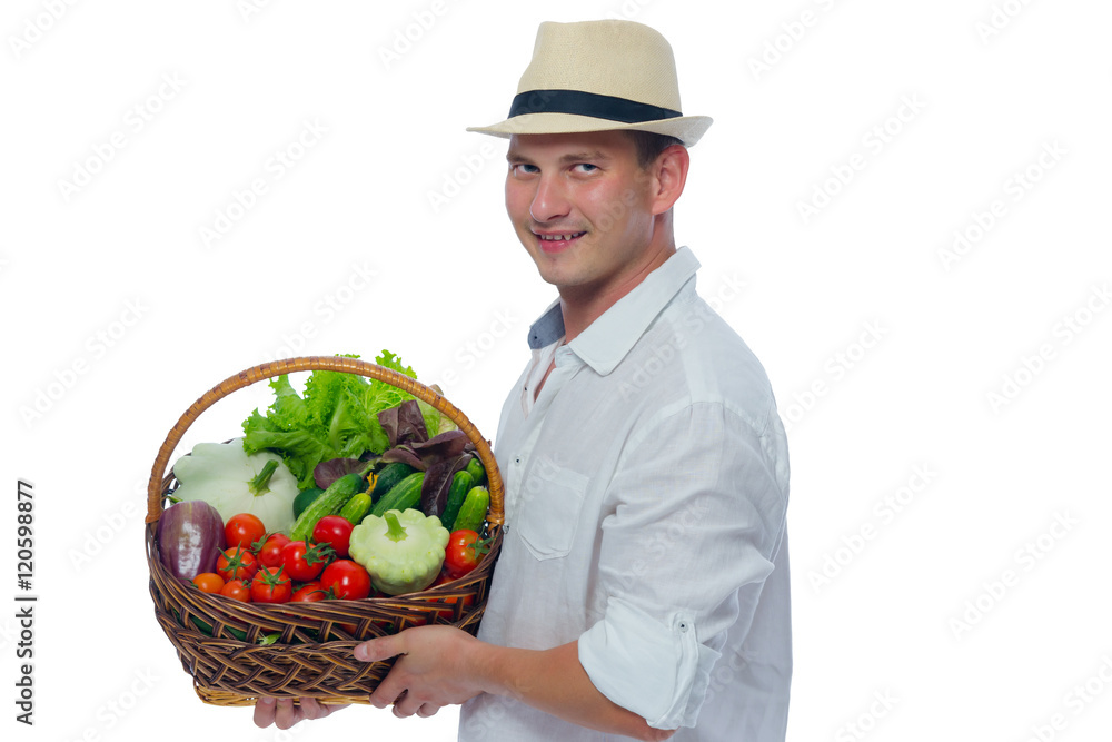 basket with vegetables in farmer's hands on a white background basket with vegetables in farmer's hands on a white background