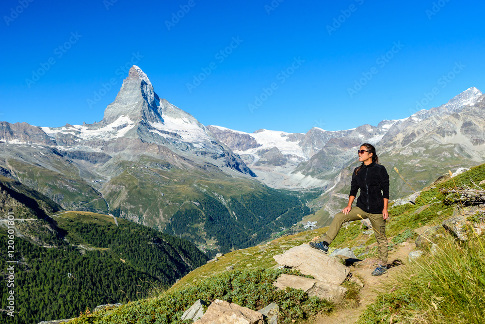 Matterhorn - Hiker in beautiful landscape of Zermatt, Switzerlan