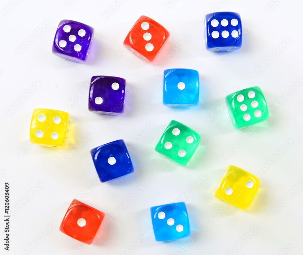 group of colored plastic dice group of colored plastic dice
