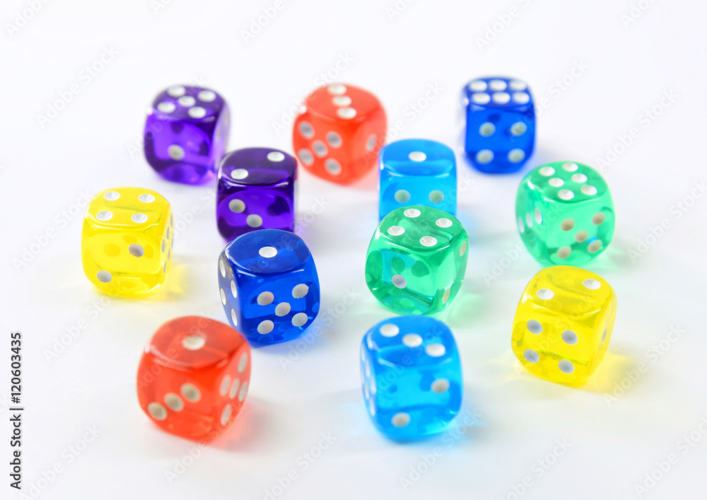 group of colored plastic dice group of colored plastic dice