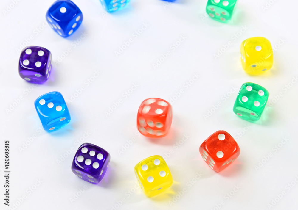 group of colored plastic dice