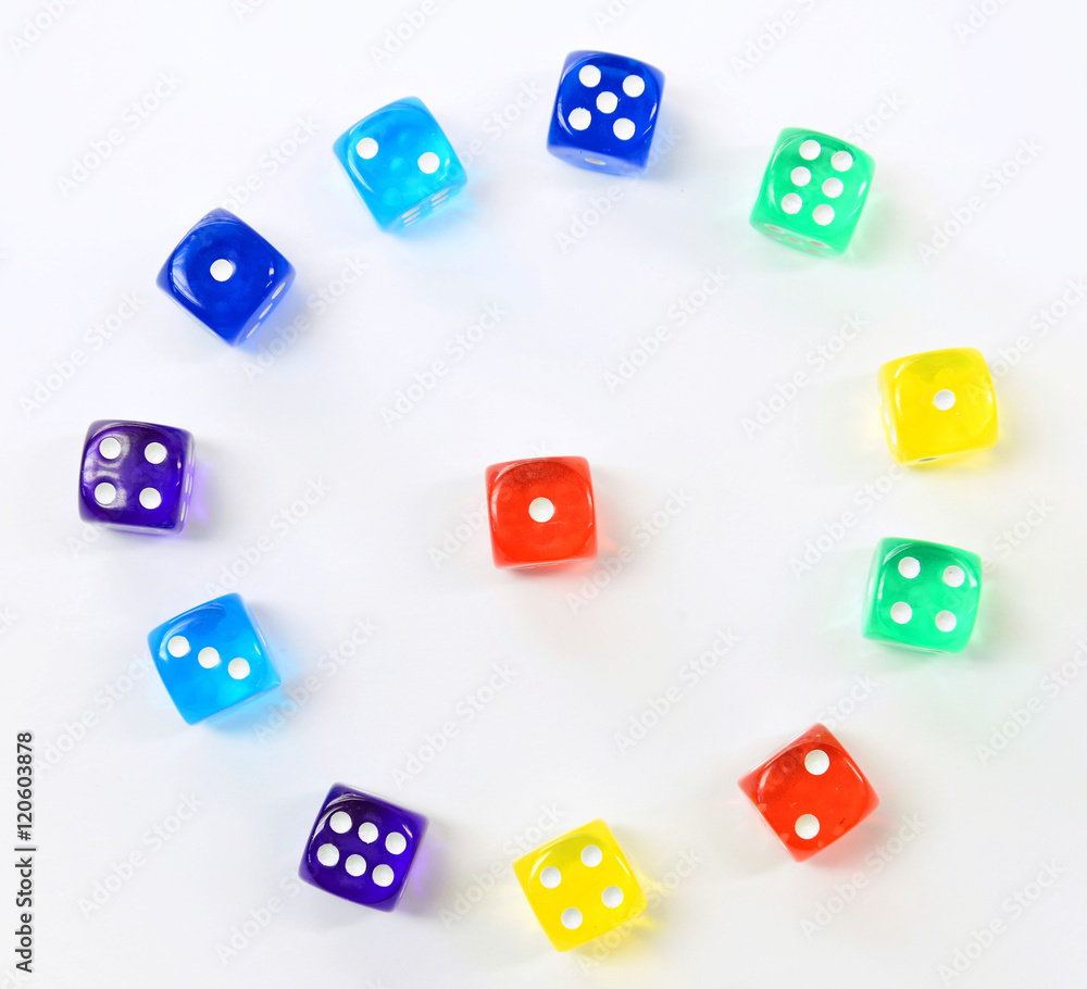 group of colored plastic dice group of colored plastic dice