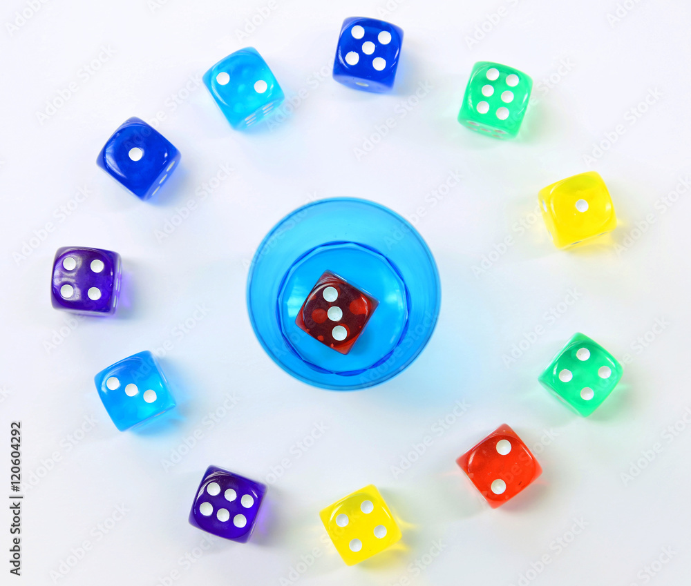 group of colored plastic dice group of colored plastic dice