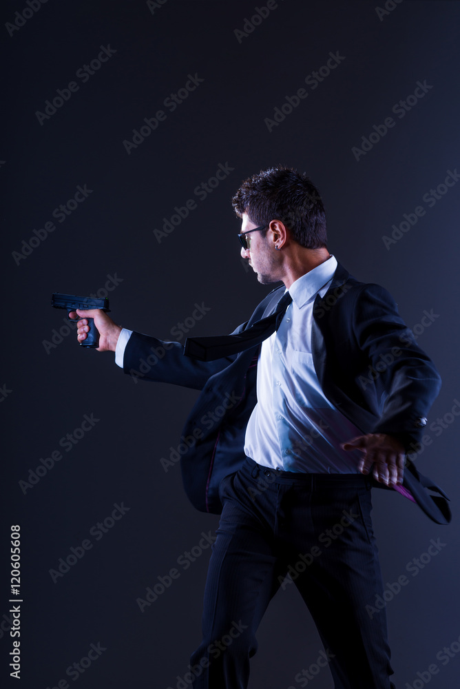Brave cool man holding a gun Brave cool man holding a gun