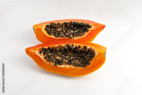 slices of sweet papaya on white background