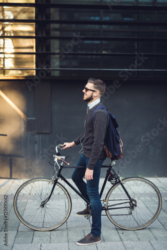  Cycling through the city © bernardbodo