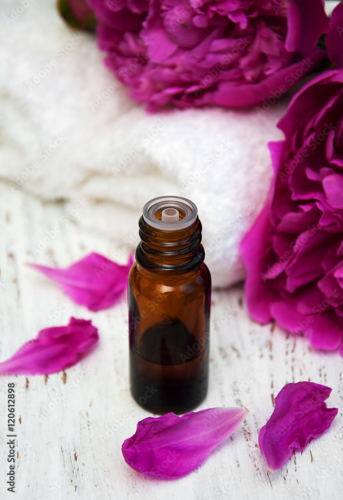 Peony flowers and massage oils Peony flowers and massage oils