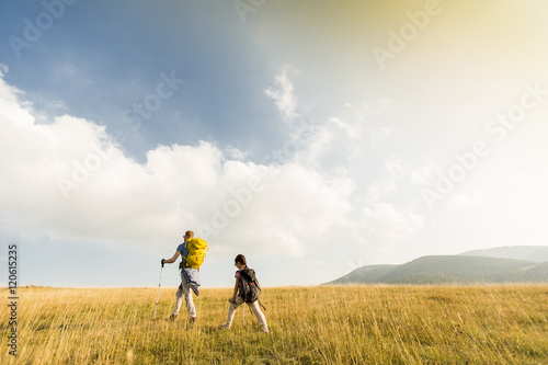 Father with daughter hiking