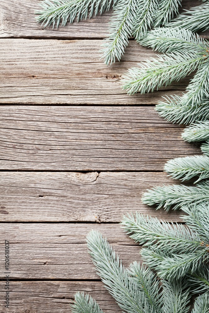 Christmas wooden background with fir tree Christmas wooden background with fir tree