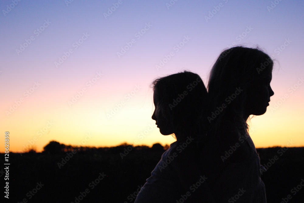SISTERS IN EVENING AMBIENCE