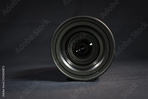 Digital Cinema Camera lens on a black table top.