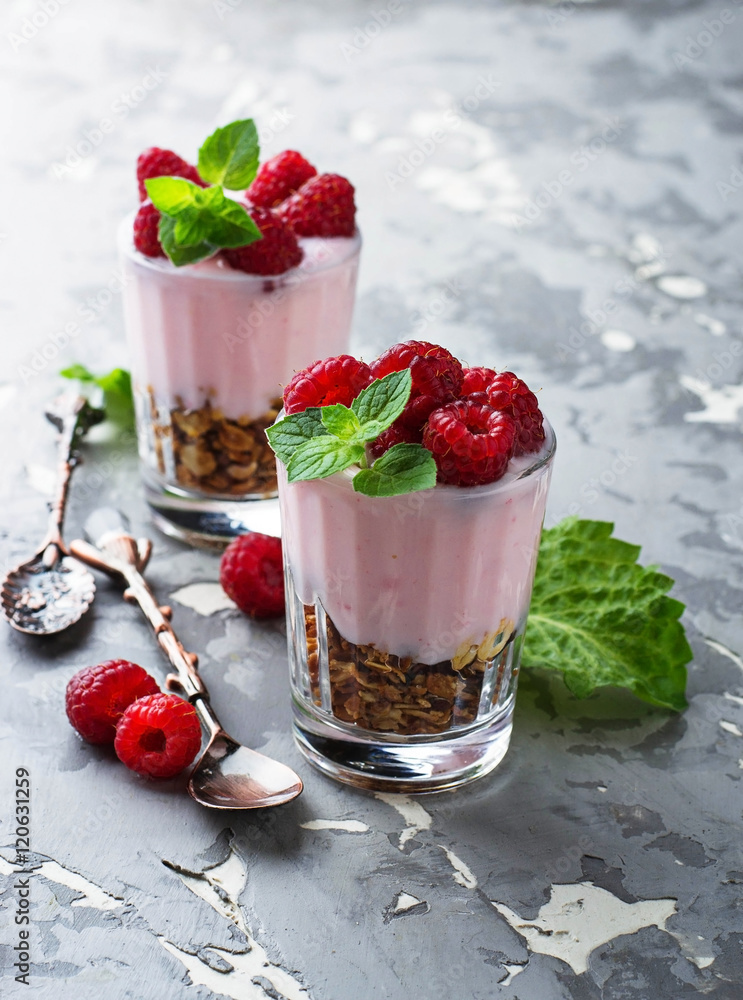 Dessert with granola, yogurt and raspberry Dessert with granola, yogurt and raspberry