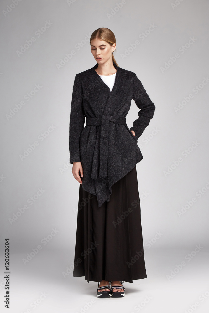 Beautiful sexy woman blond long hair wear black silk dress Beautiful sexy woman blond long hair wear black silk dress