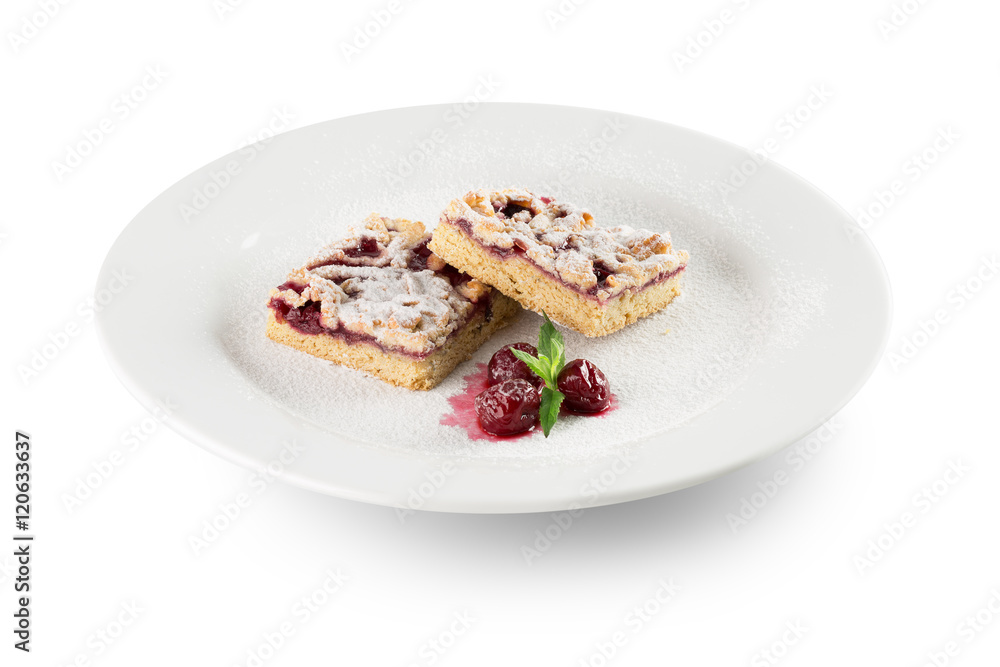 grated pie on a white plate with raspberries