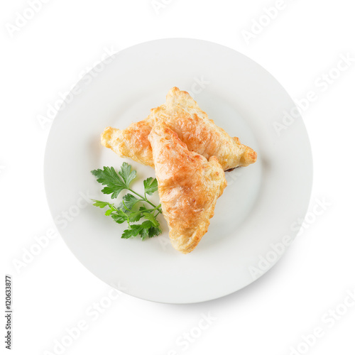 croissants on white plate isolated on the white background
