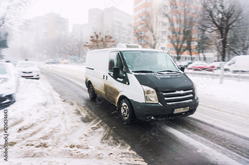 Van driving in winter © Travel_Master