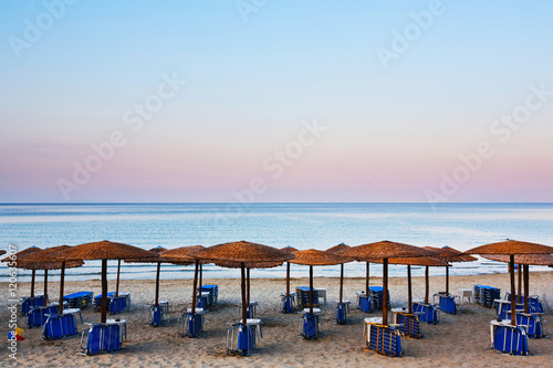 Beach beds and umbrellas