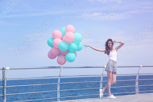 Beautiful young woman with ...