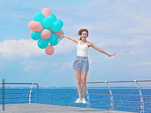 Beautiful young woman with ...