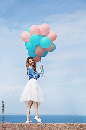 Beautiful young woman with ...