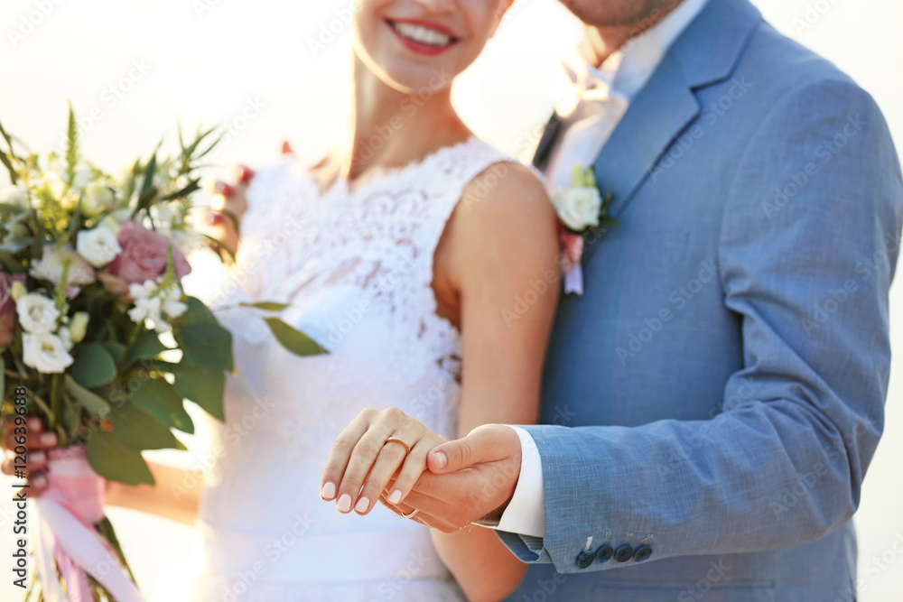 Groom and bride hugging, outdoor Groom and bride hugging, outdoor
